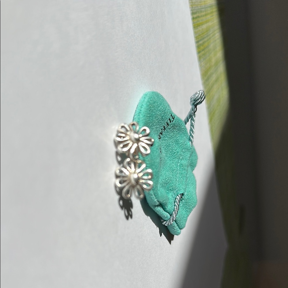 Tiffany & Co. Paloma Picasso Daisy stud earrings in sterling silver.